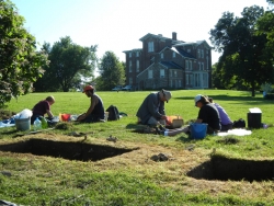 A number of students at Archaeological dig at White Hall State Historic Site